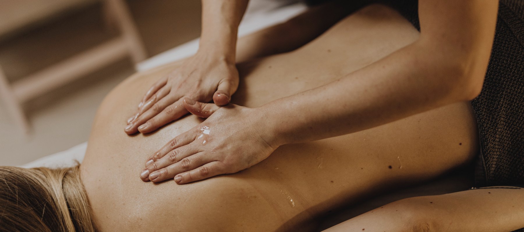 Client receiving a relaxing back massage